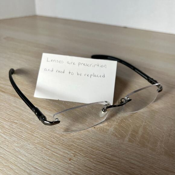 Ray-Ban RB8402 2502 Eyeglasses Rimless Carbon Fiber Black Frames 52-17-140 - Picture 1 of 11